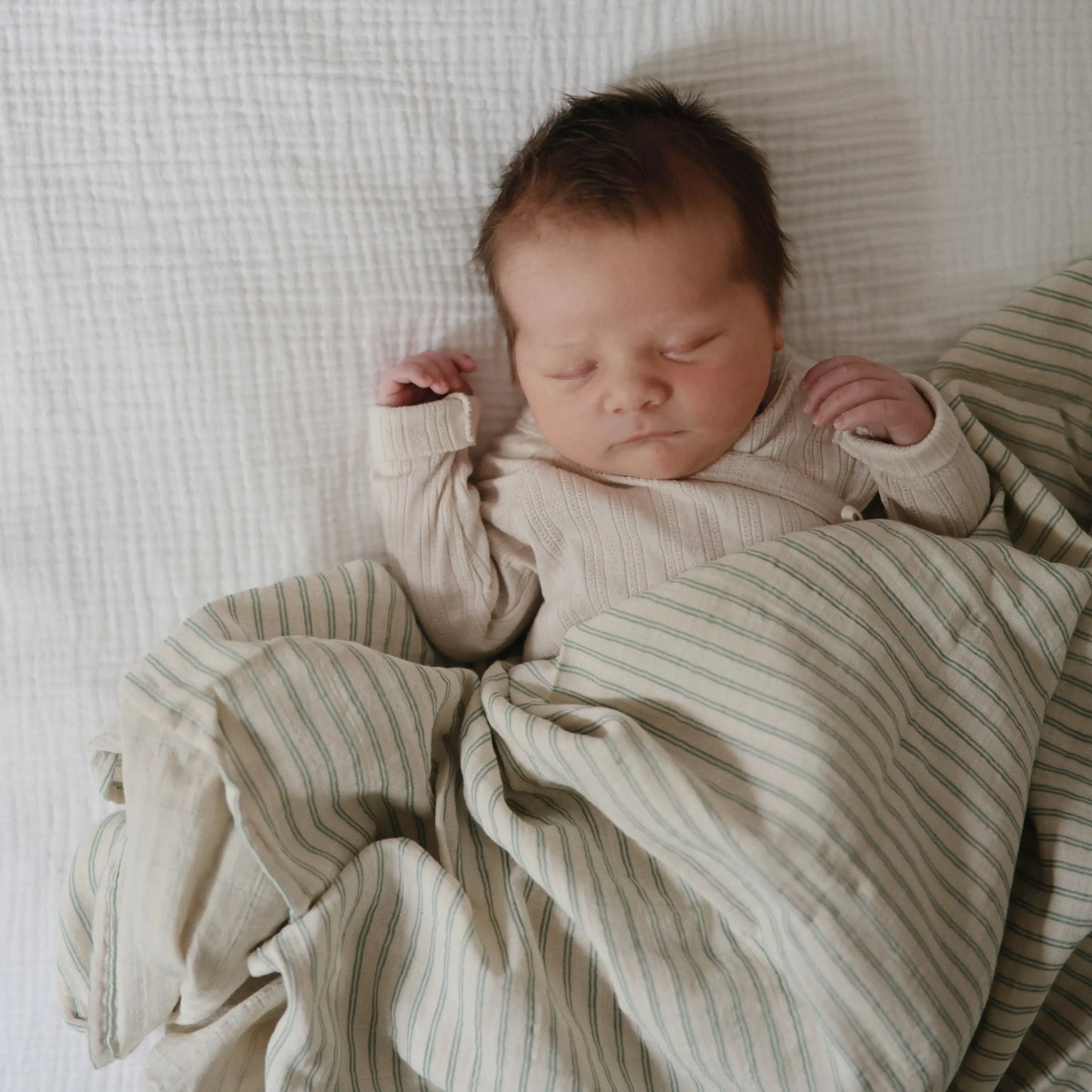 Organic Cotton Muslin Swaddle Blanket for Baby Cuddling and Nursing Mushie