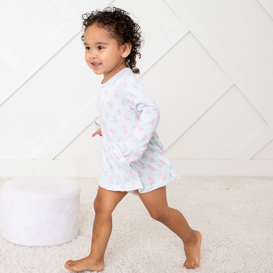 Ballerina-print long-sleeve bodysuit dress in pink on a toddler model