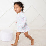 Ballerina-print long-sleeve bodysuit dress in pink on a toddler model