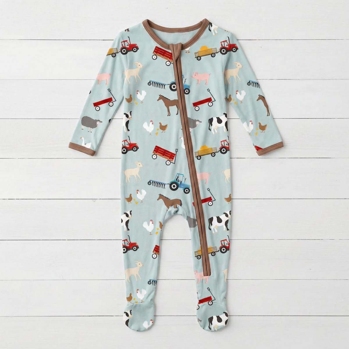 Baby footie pajamas with barnyard animal print and full-length two-way zipper