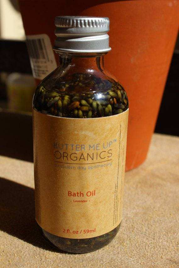 Bath oil with relaxing lavender in a 2oz bottle, featuring organic lavender buds.