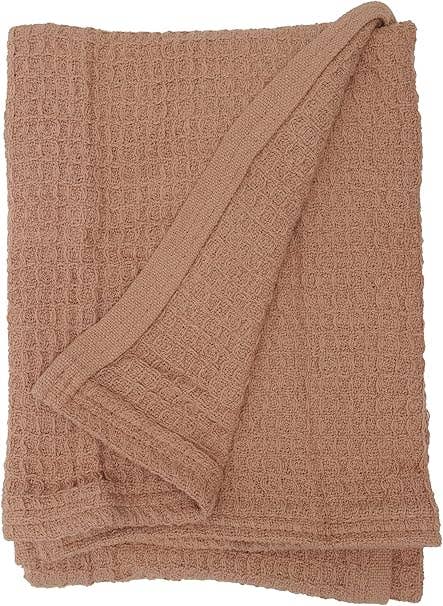 Crover 100% cotton waffle baby blanket for swaddling and stroller coverage.