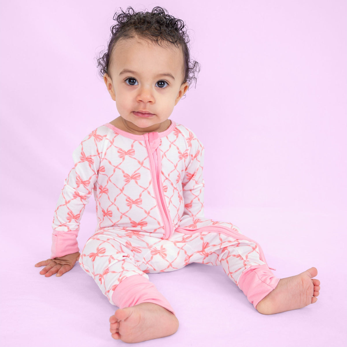 LollyBanks Beautiful Bows Zipper One Piece PajamaEveretts Place