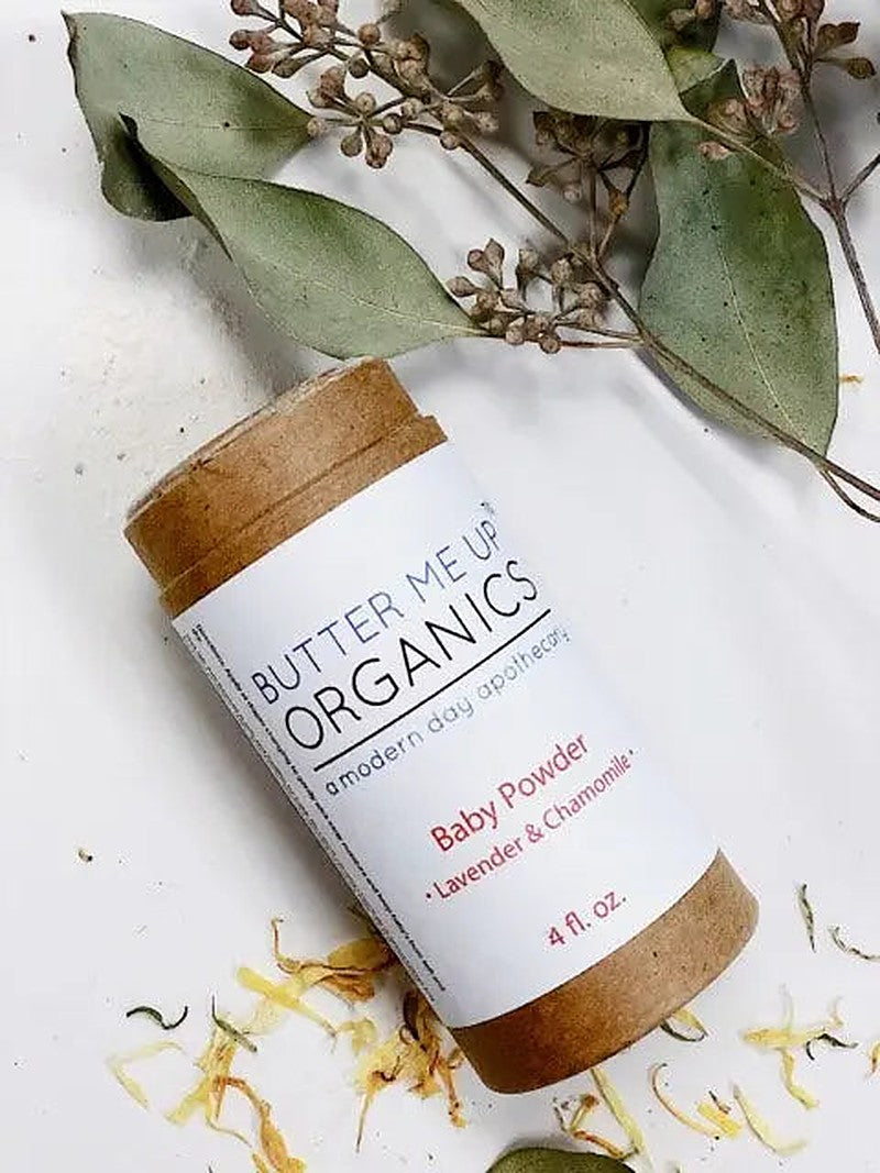 Glass bottle of talc-free baby powder made with arrowroot, chamomile, and lavender