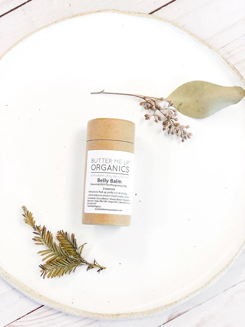Organic pregnancy balm in compostable tube for skin hydration and elasticity.