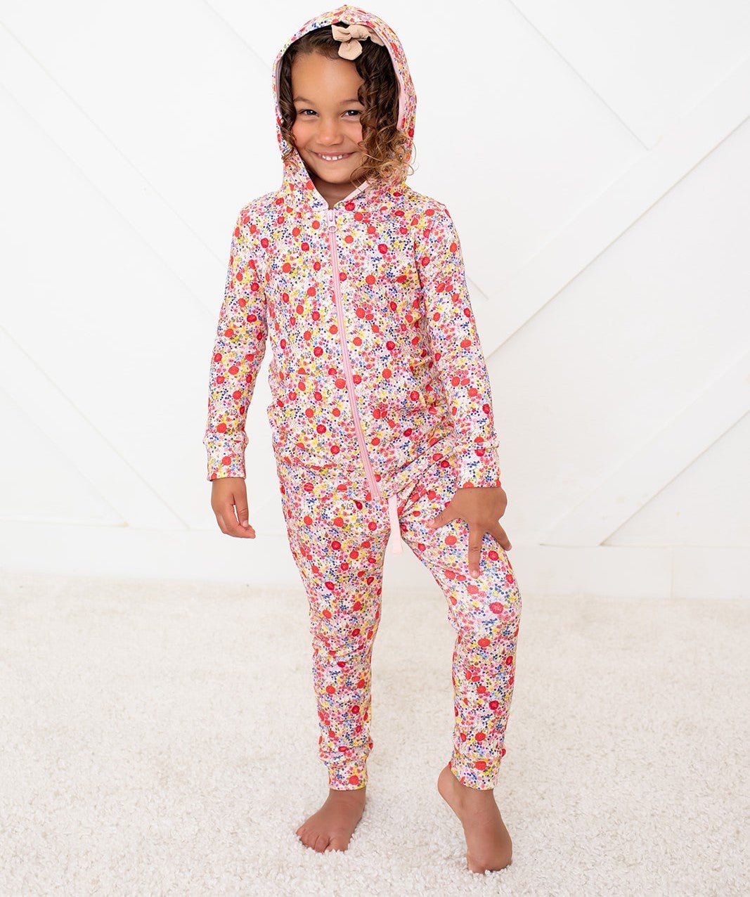 Bestaroo Blush Bloom baby zipper hoodie with a delicate pink floral pattern, on a white background.