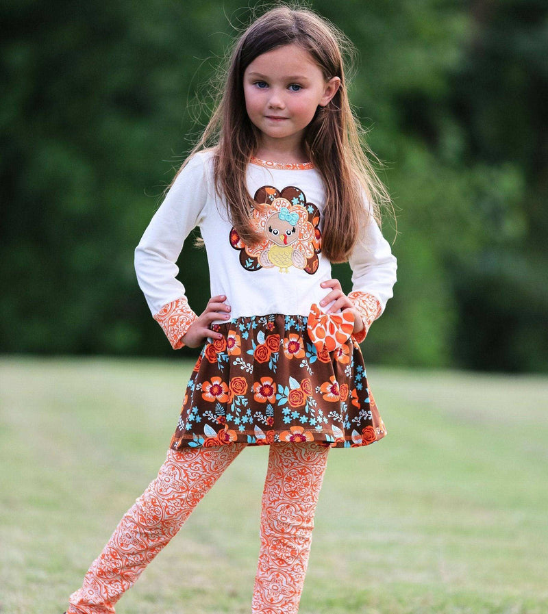 Girls autumn floral turkey tunic and leggings outfit with cream top, turkey applique, and orange damask bow.