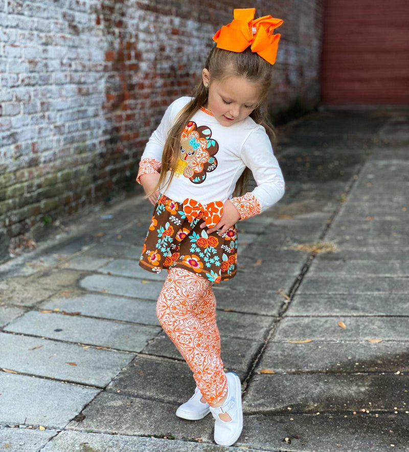 Girls autumn floral turkey tunic and leggings set with orange bow and turkey applique.