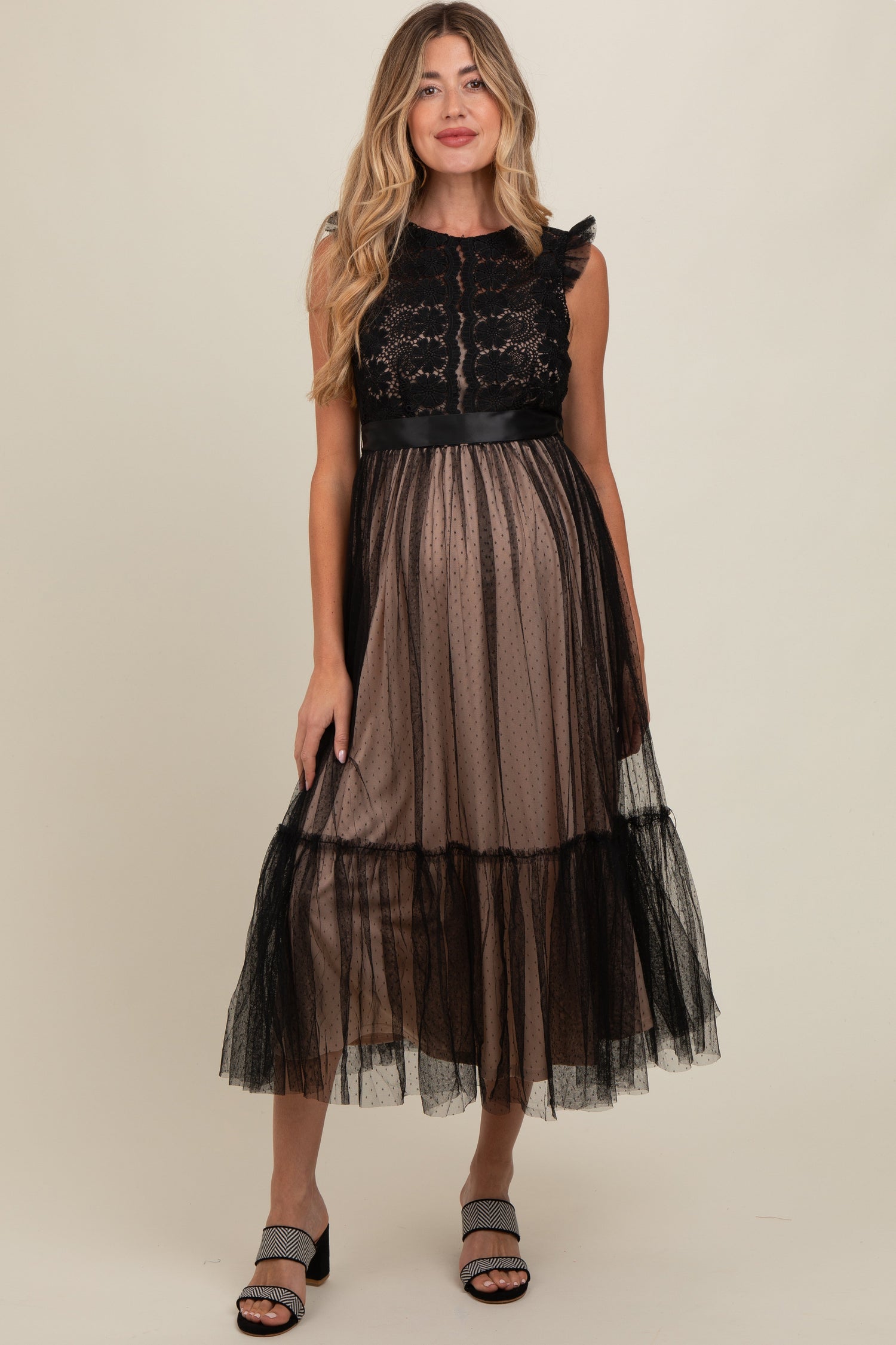 Pregnant model wearing an elegant PinkBlush Black Lace Tulle Maternity Maxi Dress, full length.