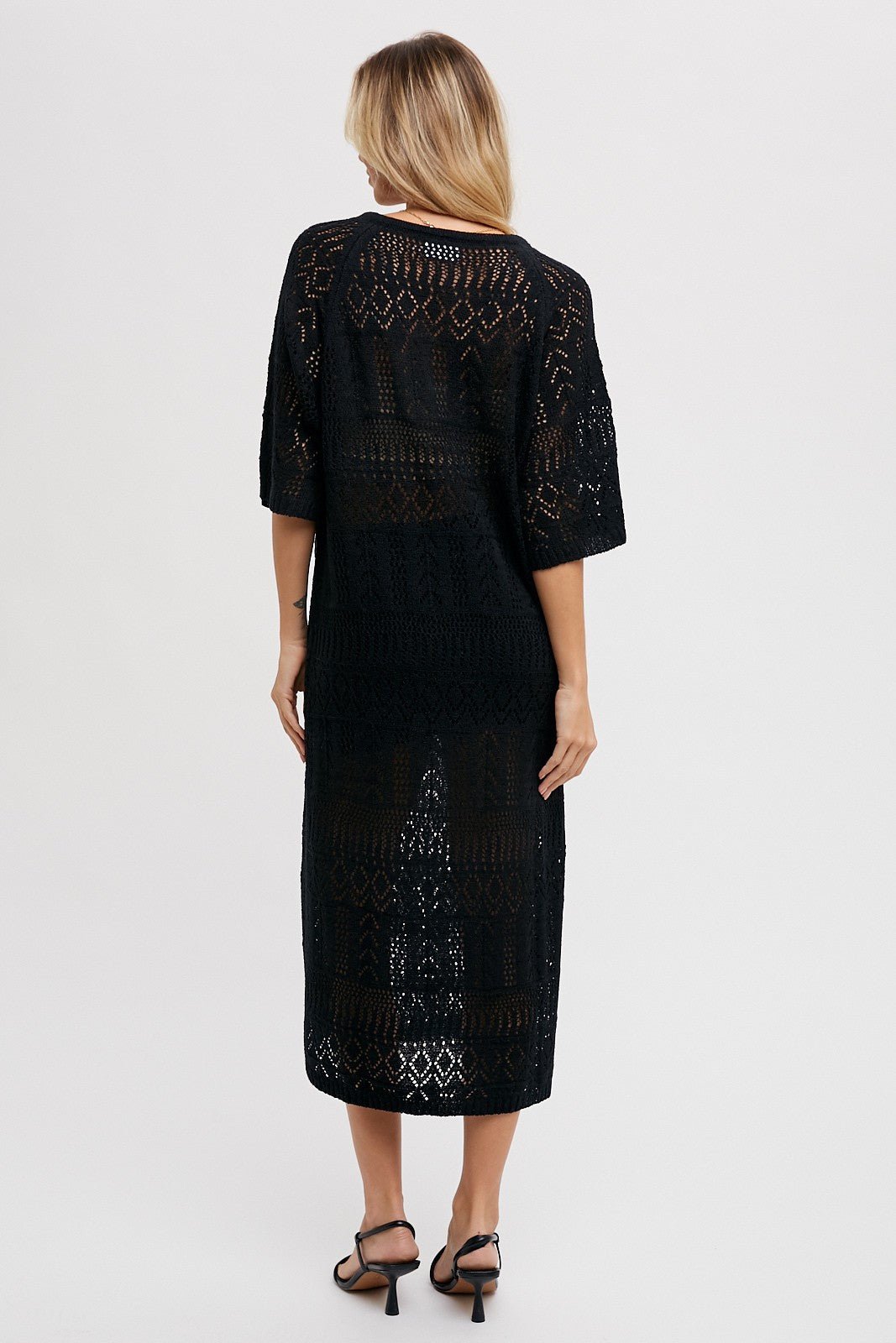 Model wearing a Black Open Knit Front Tie Side Slit Midi Swim Cover-Up by PinkBlush