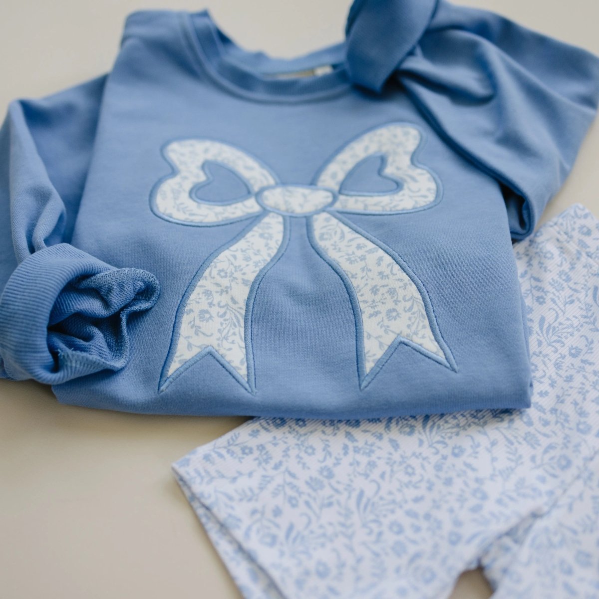 Little Joy Co. Blue Toile Applique Bow Crewneck Sweatshirt Romper Style - Everetts Place Boutique - 