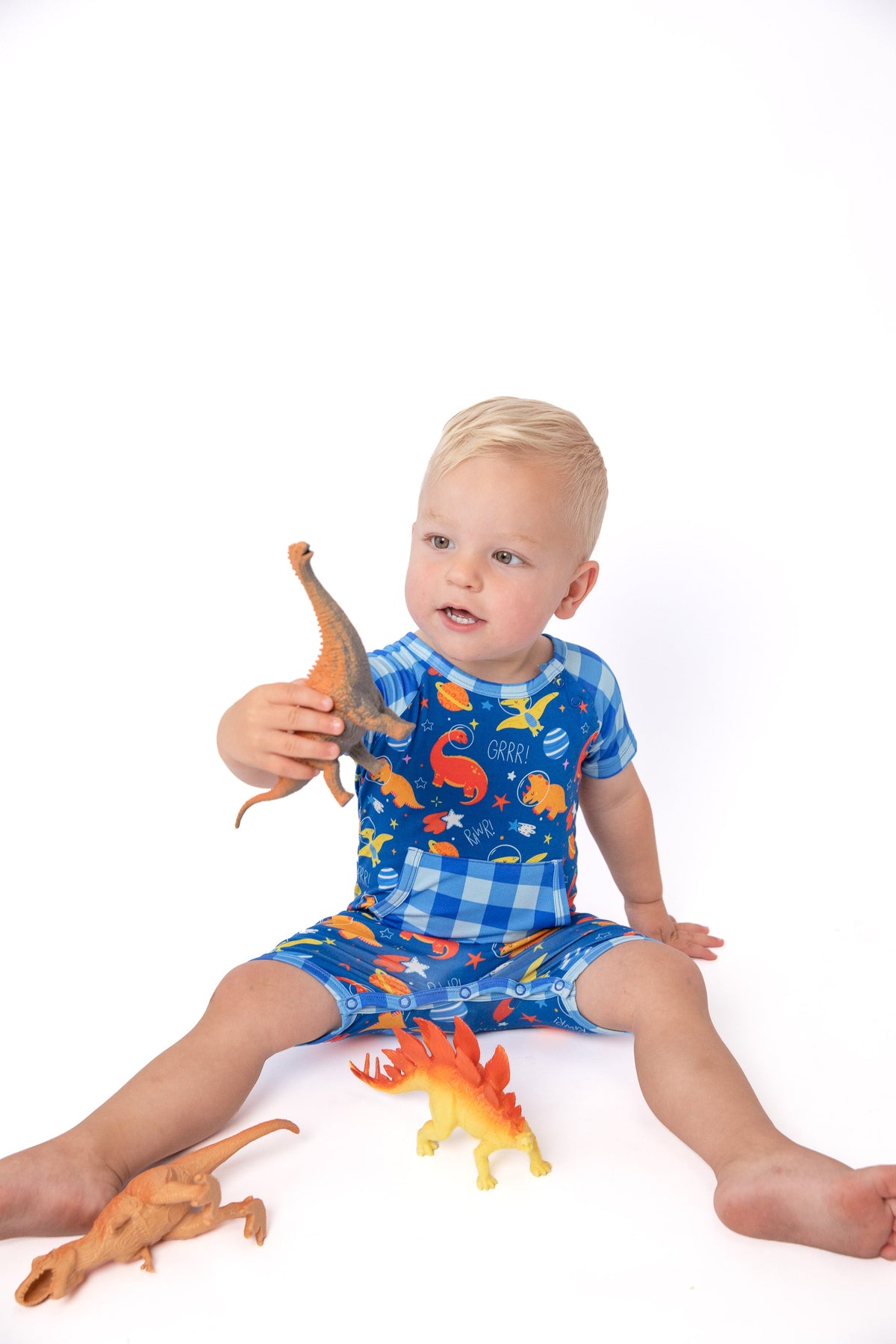 Space Dinosaur Bamboo Short Romper | Electric Blue by Rayn’s Tiny Stitches