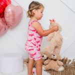 Baby two-piece set with pink floral flutter-sleeve tank top and matching shorts