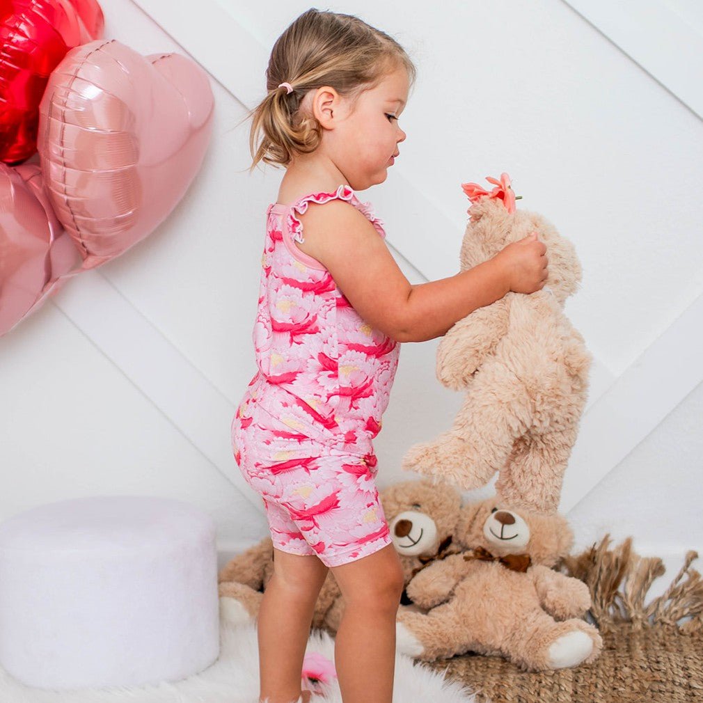 Baby two-piece set with pink floral flutter-sleeve tank top and matching shorts