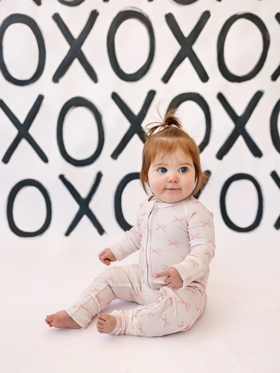 Little Joy Co. Blushing Bows Ribbed Bamboo Zippy Romper With Foldover Feet - Everetts Place Boutique - 