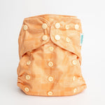 Abstract: Essentials Pocket Cloth Diaper with Athletic Wicking Jersey, Grows with your Baby - Everetts Place Boutique - Pocket Diaper