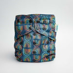 Abstract: Essentials Pocket Cloth Diaper with Athletic Wicking Jersey, Grows with your Baby - Everetts Place Boutique - Pocket Diaper