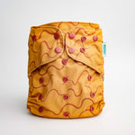 Abstract: Essentials Pocket Cloth Diaper with Athletic Wicking Jersey, Grows with your Baby - Everetts Place Boutique - Pocket Diaper