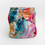 Abstract: Essentials Pocket Cloth Diaper with Athletic Wicking Jersey, Grows with your Baby - Everetts Place Boutique - Pocket Diaper