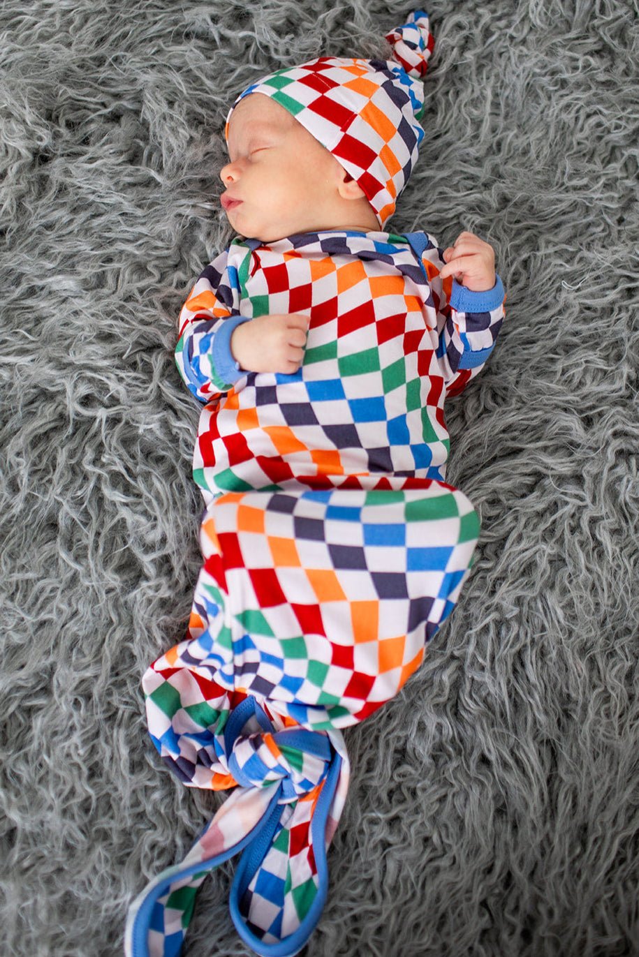 Baby gown and matching hat in a bold checkered print with fold-over hand mittens