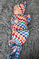 Baby gown and matching hat in a bold checkered print with fold-over hand mittens
