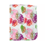 Swaddle blanket with pink botanical Swiss cheese plant leaf print, spread out flat