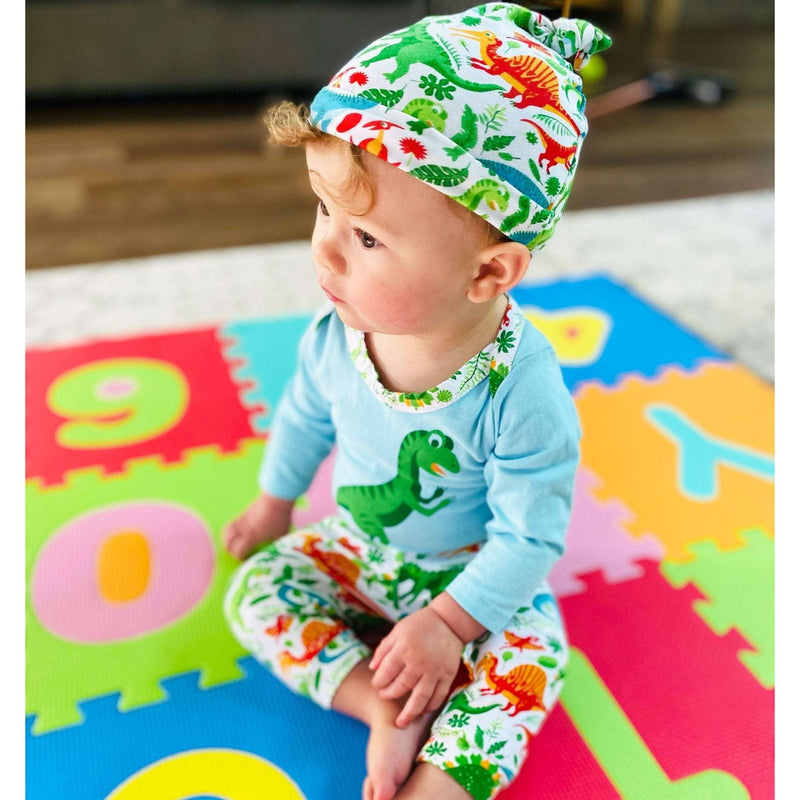 Boys dinosaur long sleeve onesie set with pants and cap, featuring cute dinosaur design.