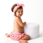 Pink baby bloomer with back ruffles and a matching stretchy headband set