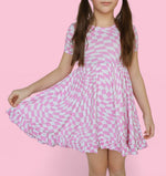 DREAM BIG LITTLE CO BUBBLEGUM WAVY CHECKERS DREAM RUFFLE DRESSEveretts Place