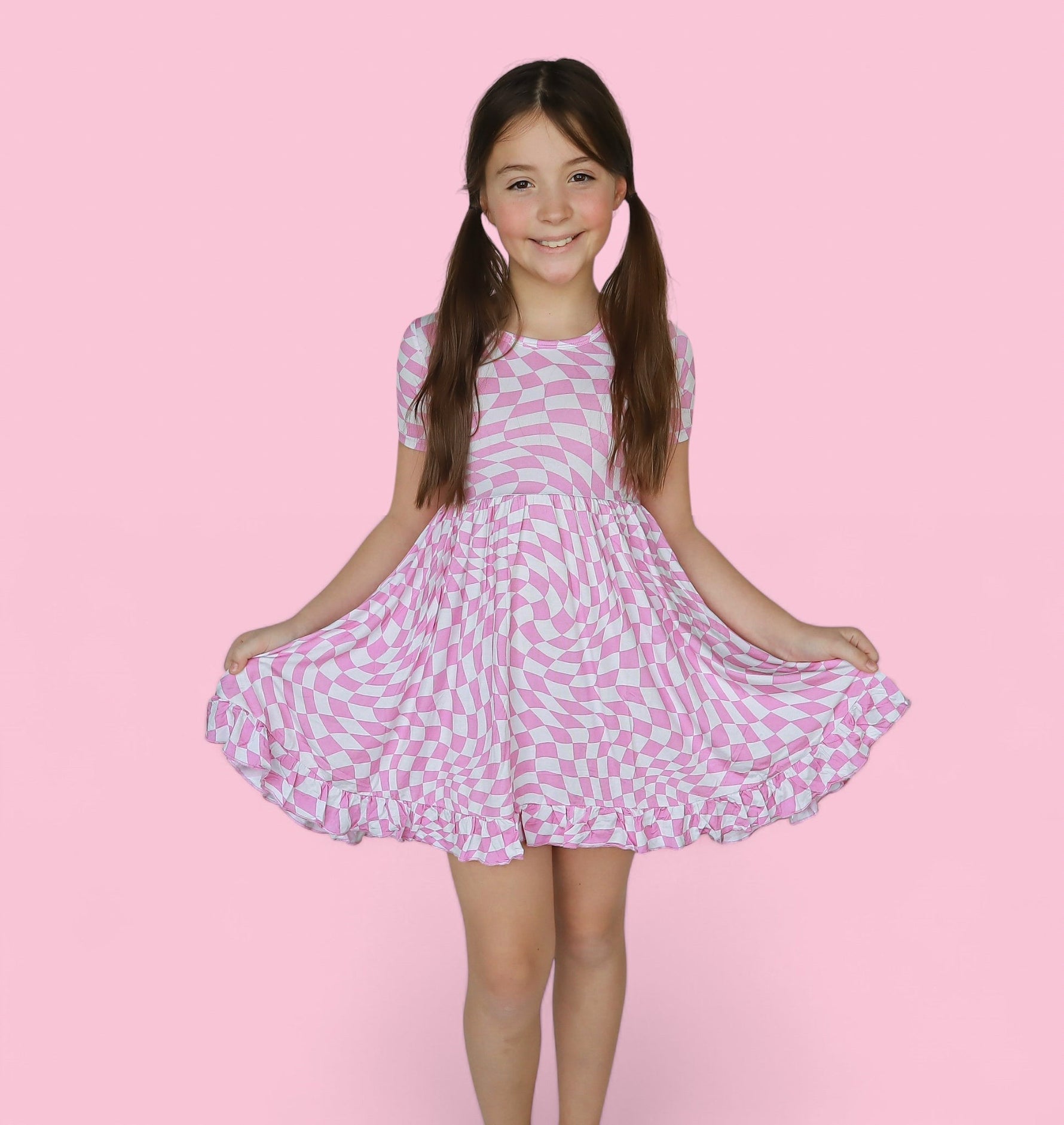 DREAM BIG LITTLE CO BUBBLEGUM WAVY CHECKERS DREAM RUFFLE DRESSEveretts Place