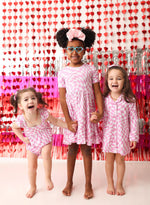 DREAM BIG LITTLE CO BUBBLEGUM WAVY CHECKERS DREAM RUFFLE DRESSEveretts Place