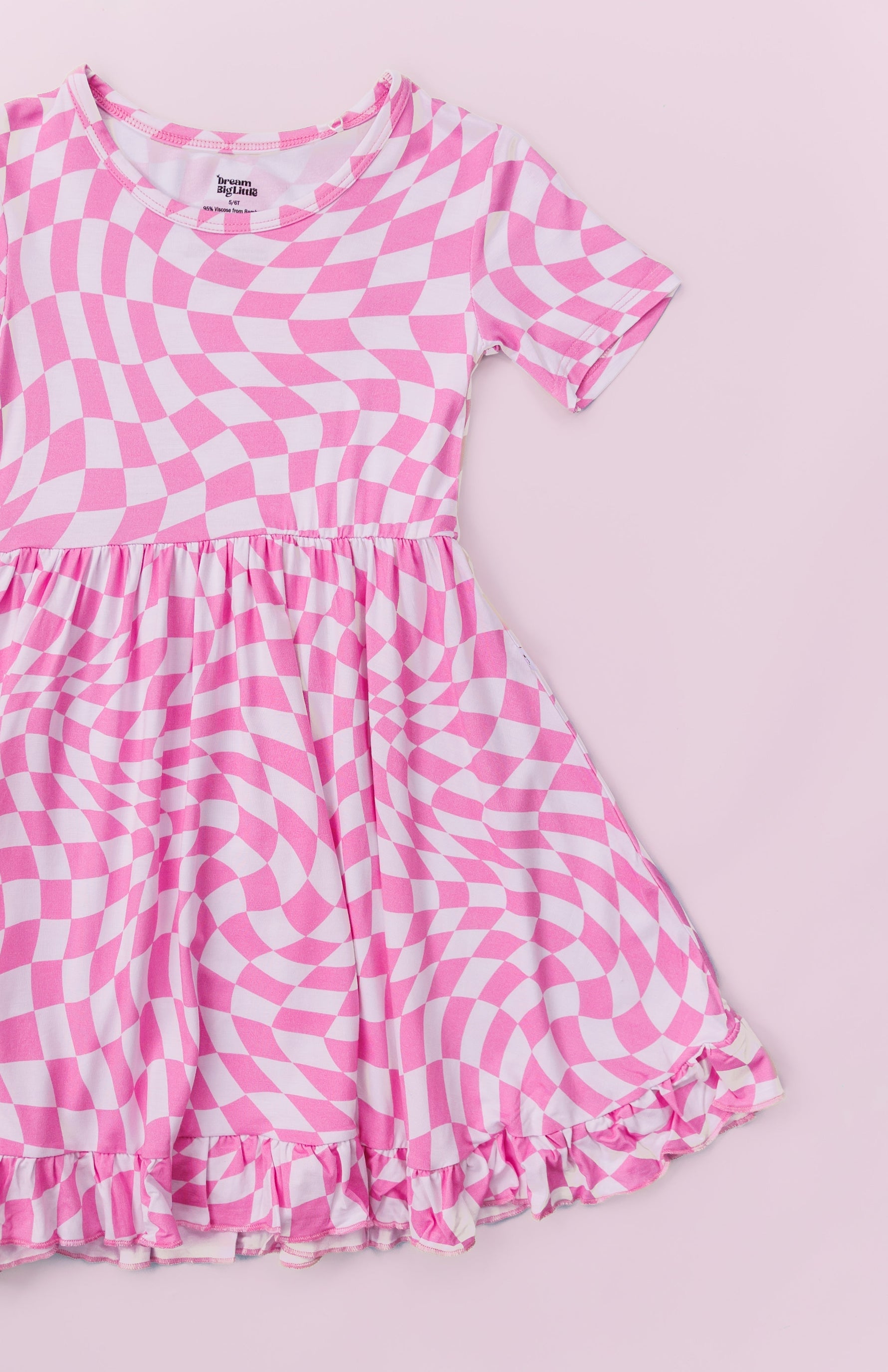 DREAM BIG LITTLE CO BUBBLEGUM WAVY CHECKERS DREAM RUFFLE DRESSEveretts Place