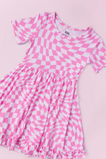 DREAM BIG LITTLE CO BUBBLEGUM WAVY CHECKERS DREAM RUFFLE DRESSEveretts Place