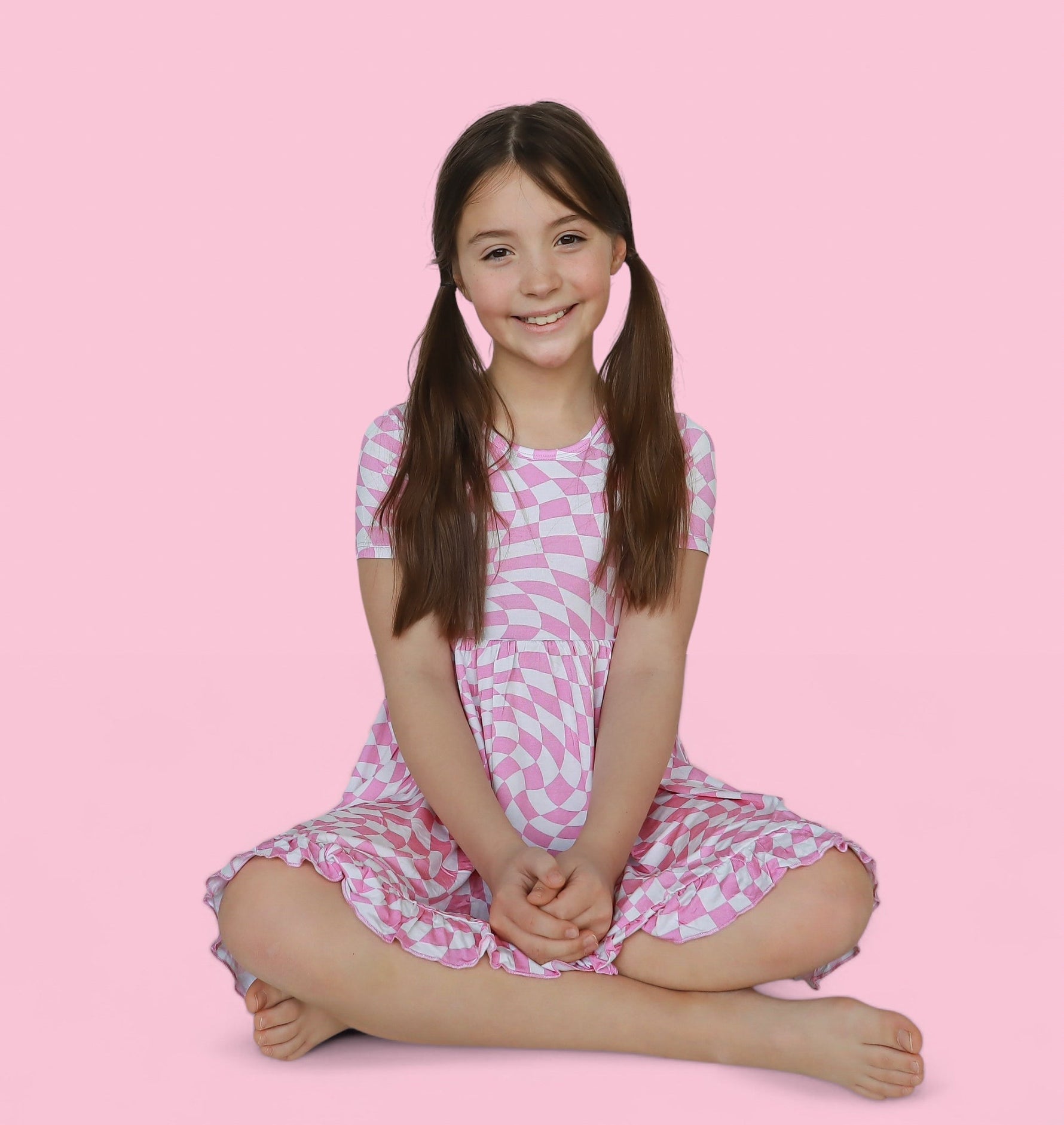 DREAM BIG LITTLE CO BUBBLEGUM WAVY CHECKERS DREAM RUFFLE DRESSEveretts Place