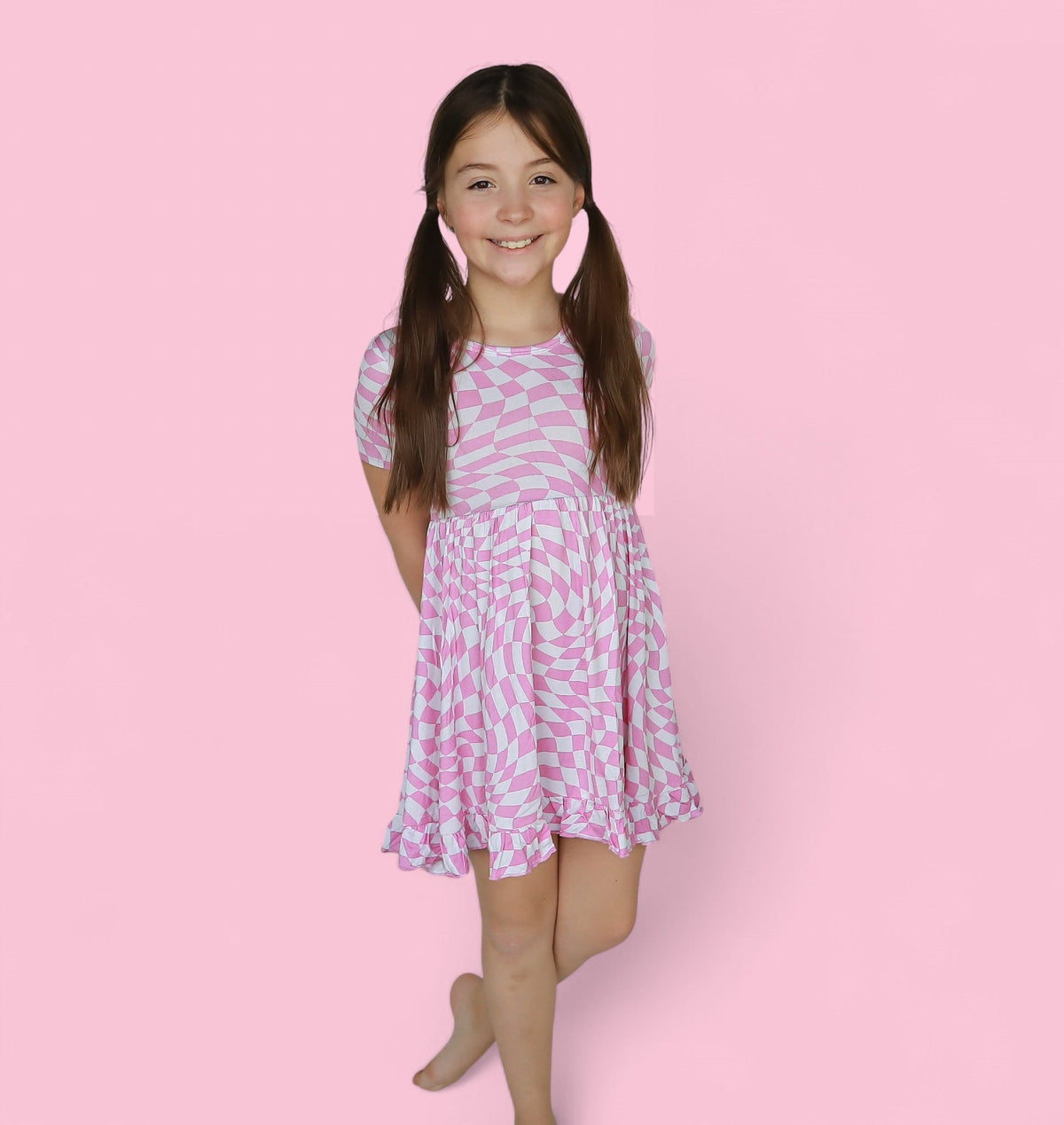 DREAM BIG LITTLE CO BUBBLEGUM WAVY CHECKERS DREAM RUFFLE DRESSEveretts Place