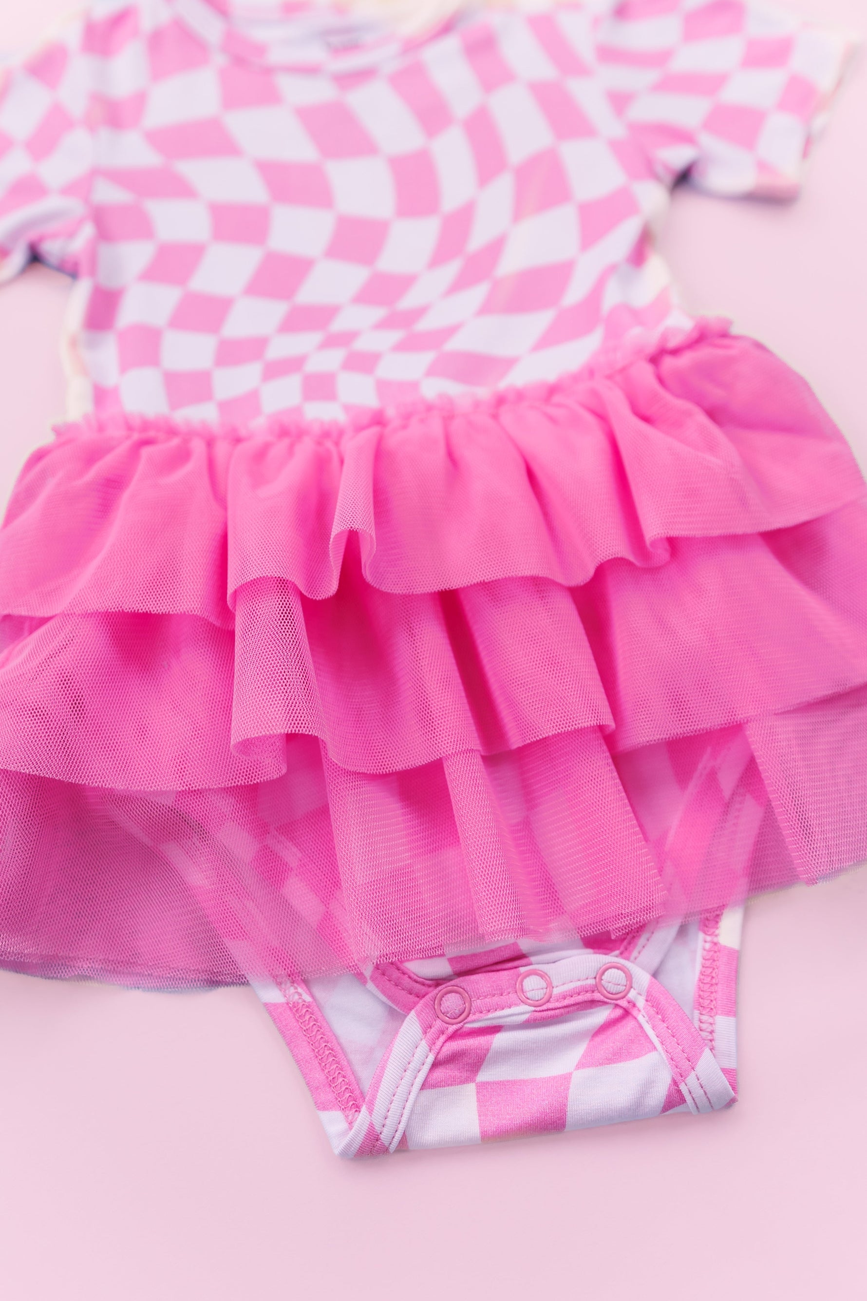 DREAM BIG LITTLE CO BUBBLEGUM WAVY CHECKERS DREAM TUTU BODYSUIT DRESSEveretts Place