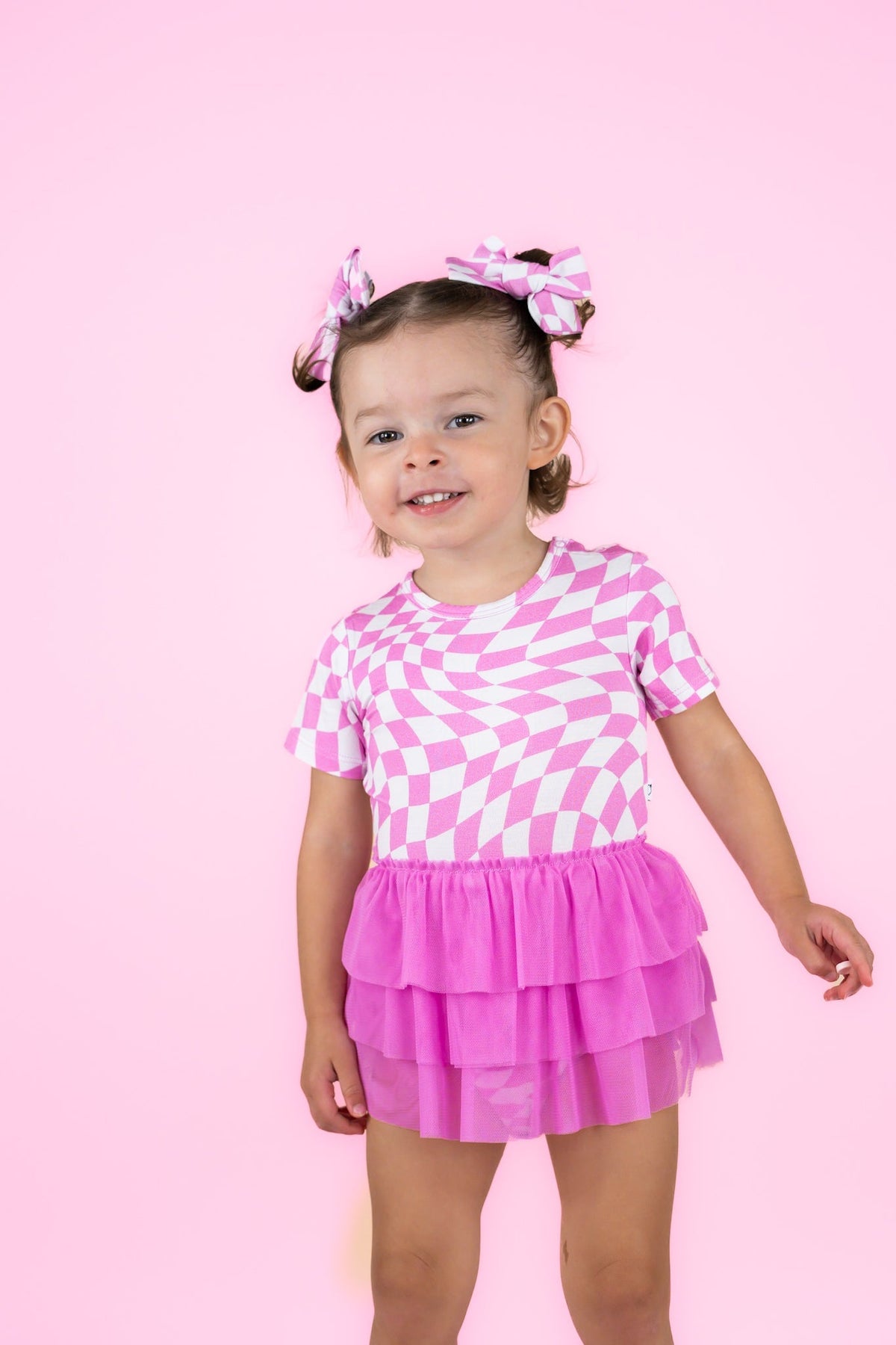 DREAM BIG LITTLE CO BUBBLEGUM WAVY CHECKERS DREAM TUTU BODYSUIT DRESSEveretts Place