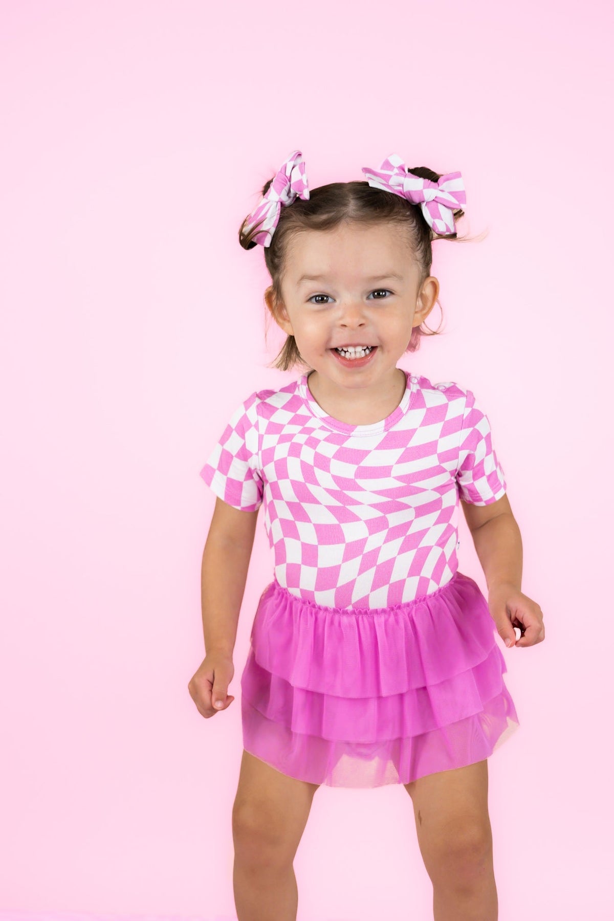 DREAM BIG LITTLE CO BUBBLEGUM WAVY CHECKERS DREAM TUTU BODYSUIT DRESSEveretts Place