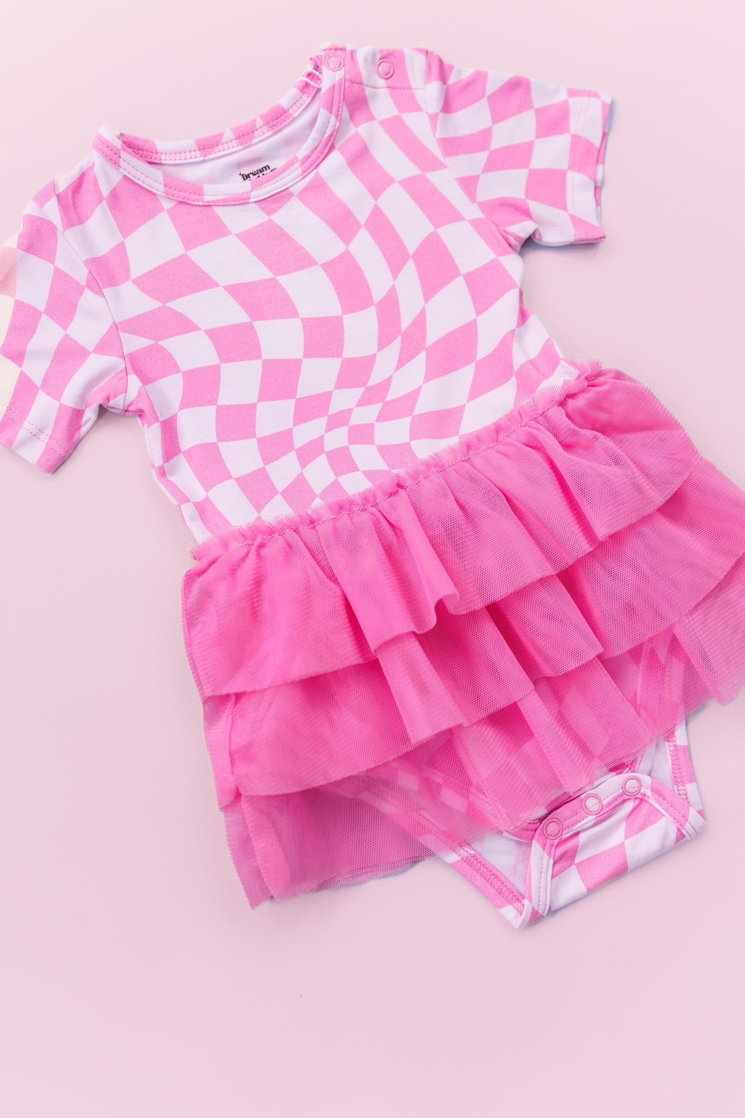 DREAM BIG LITTLE CO BUBBLEGUM WAVY CHECKERS DREAM TUTU BODYSUIT DRESSEveretts Place