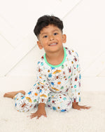 Two-piece long sleeve baby pajama set with bug print top and matching pajama bottoms