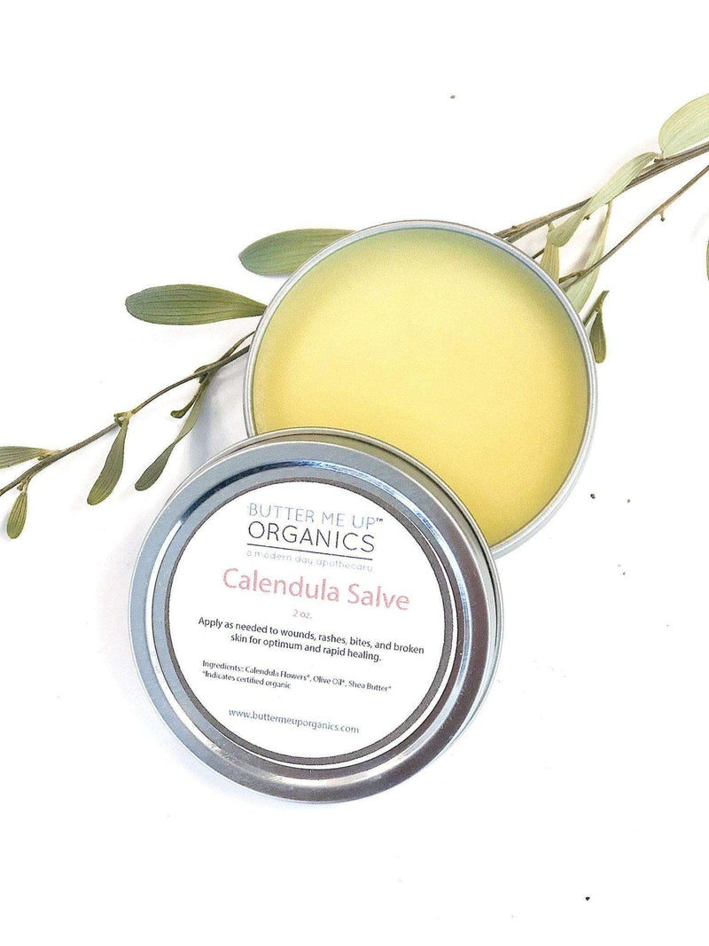 Calendula Flower Balm in metal tin, made with organic ingredients, ideal for healing skin issues.