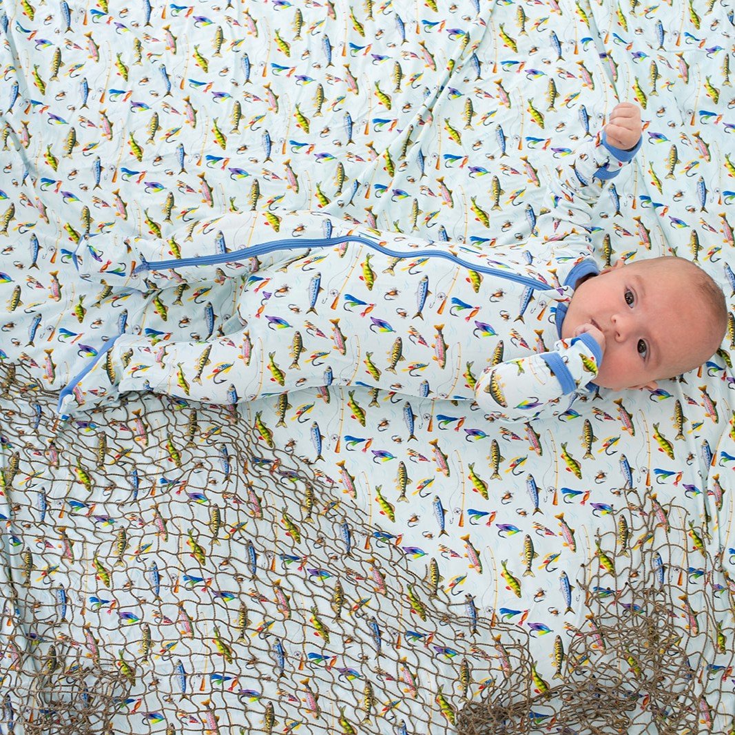 Baby footie pajamas with a colorful fall fish print, a full-length two-way zipper, and covered feet.