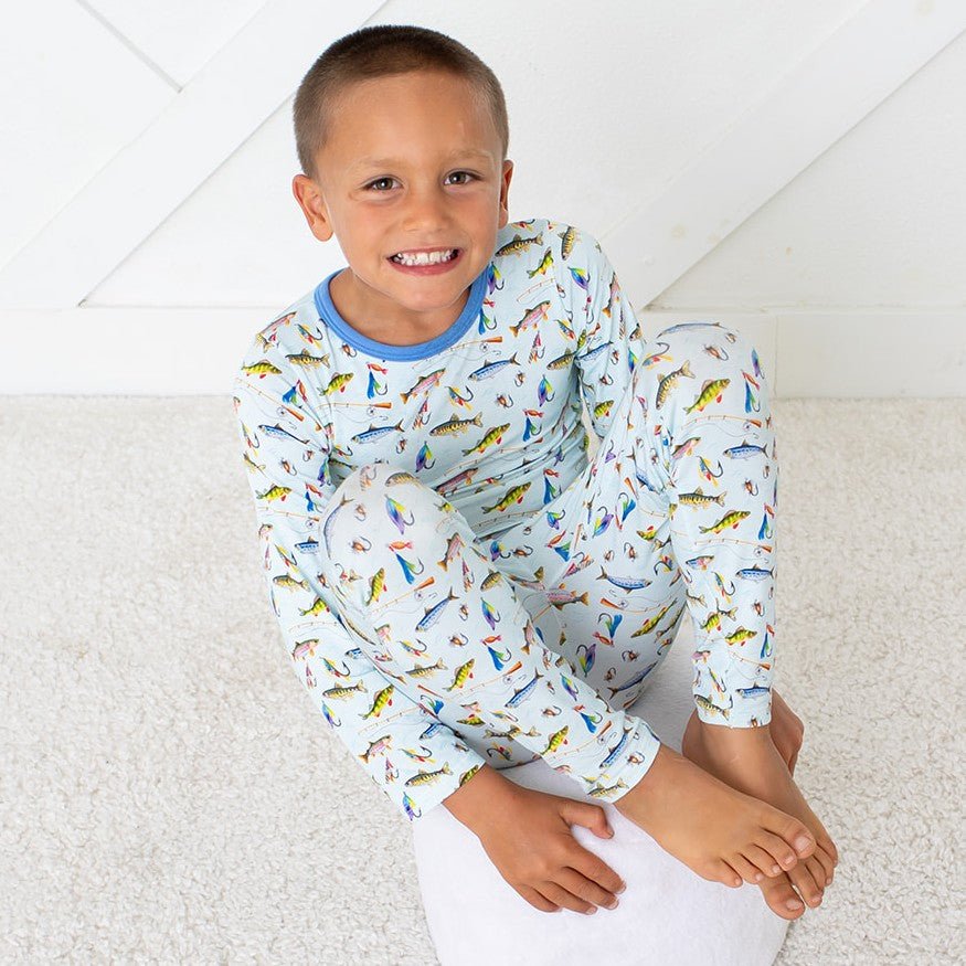 Long-sleeve pajama set with a colorful whimsical fish print on a soft fabric