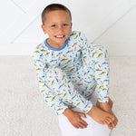Long-sleeve pajama set with a colorful whimsical fish print on a soft fabric