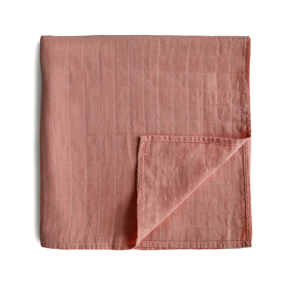 Soft Mushie organic cotton muslin baby swaddle blanket.