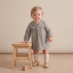 Baby dress in charcoal plaid with embroidered Peter Pan collar, shown with matching bloomers