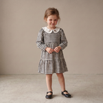Charcoal plaid tiered baby dress with a collared neckline and gathered tiers