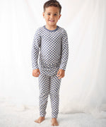 Two-piece baby pajama set with long-sleeve top and pants in a blue checkered pattern