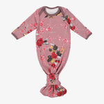 Baby gown in mauve cherry blossom print with overlap shoulder, tie bottom, and fold-over mitten cuffs