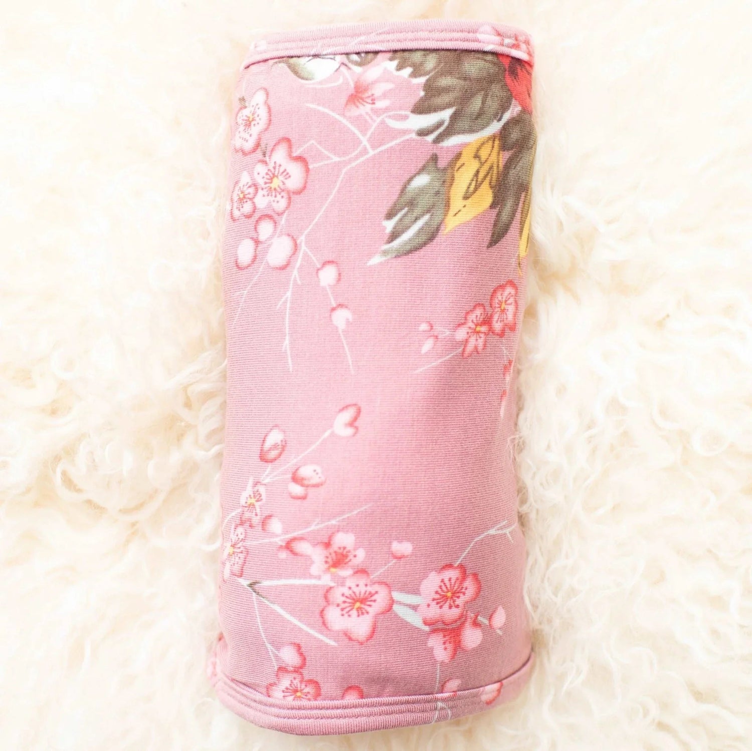 Square baby swaddle blanket in twilight mauve with a cherry blossom pattern